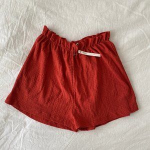 ASOS Petite jersey beach shorts in crinkle rust